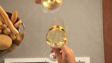 Couple toasting with wine at restaurant