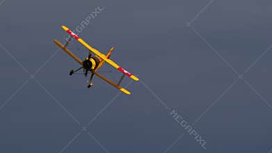 Bucker Bu 133 Jungmeister RC model in a graceful banking turn