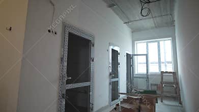 Installed glass doors in renovated enclosure of building