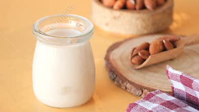 almond nut and milk on table