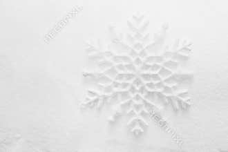 Winter, Christmas background. Snowflake on snow