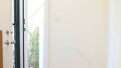 Massage Therapist Entering Front Door