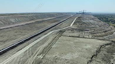 Top shot of a large bucket-wheel excavator in a lignite (brown-coal) mine. ?erial view.