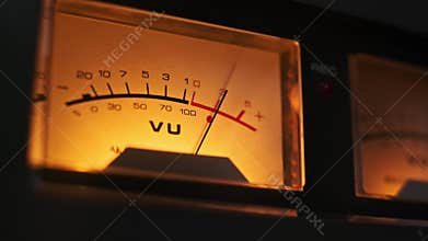 Close-Up of a Glowing Analog Meter