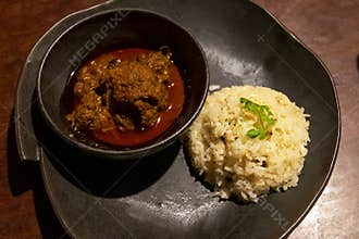 A delicious and healthy meal of beef stew and rice, made with fresh, organic ingredients