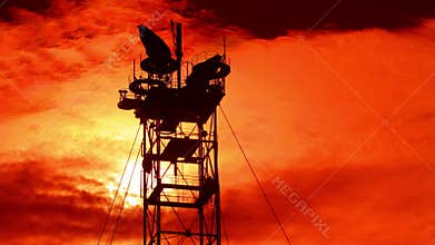 Timelapse transmission antenna in the sun.