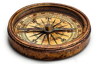 Antique brass compass isolated on white background for nautical decor and collectors display