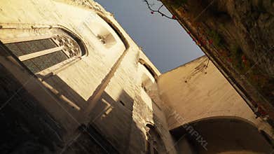 Windows in the walls of the Palais des Papes in Avignon, France