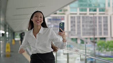 Lady Wearing Earphones, Listening To Music And Dancing In Office Walking With Motivation.