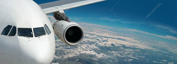 Dream liner of bright travel. Panorama above Earth