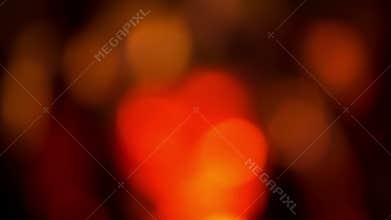 The firewood burning in the fireplace, blurred