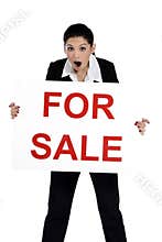 Real estate woman holding for sale sign