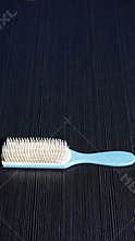 blue and white women& x27;s and men& x27;s hair comb