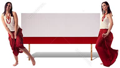 Charming fashionable woman presenting product