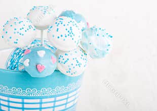 Wedding cake pops in white and soft blue.