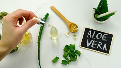 aloe vera extract and capsules. Selective focus.