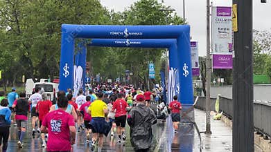 Athletes running Istanbul half marathon in historic street of Fener district