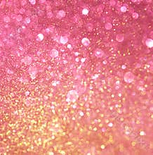Gold and pink abstract bokeh lights.