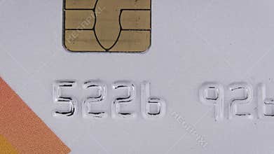 The Credit Card Rotates Close Up