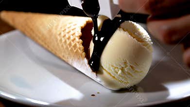 Ice cream cone scoops chocolate sauce dessert treat close,up indulgence sweet stock footage Generative AI