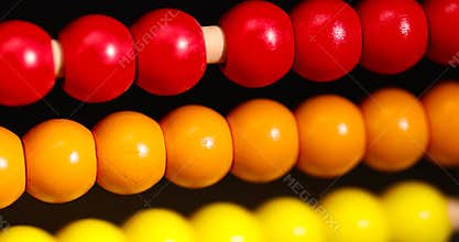 colorful wooden beads on abacus for children's play
