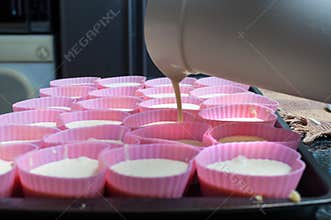 Pouring the final topping