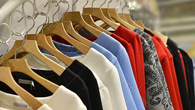 Clothes on racks in fashion shop,clothing store,clothes store,fashion shop