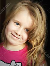 Curly blonde hair young girl