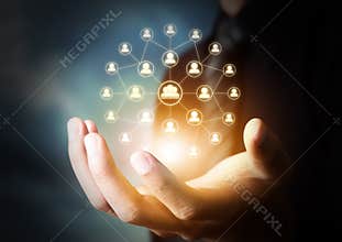 Hand holding virtual icon of social network