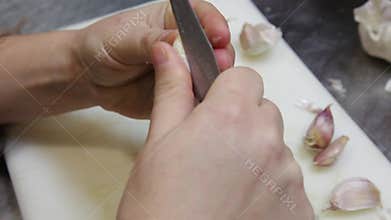 Peeling garlic