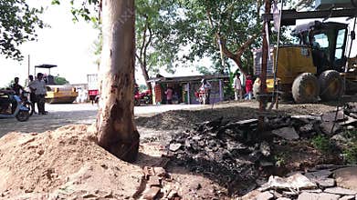 Busy Road Construction Site India, Heavy Equipment Working on Road Construction