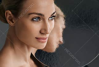 A woman with perfect and shiny skin. Concept of skin care and aesthetic cosmetology, high quality