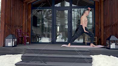 A man is doing gymnastic exercises.