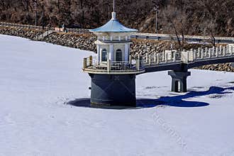Early Spring Snow - Water Release Tower Landscape at Jingyuetan National Forest Park, Changchun, China