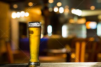 Glass of Beer on Bar Counter