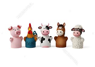 Set of colorful handmade farm animal figurines with festive holiday hat on white background