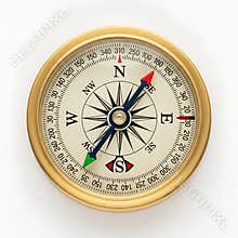 Classic compass pointing north on white background
