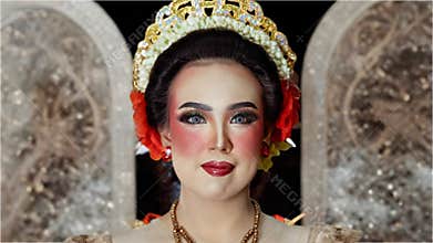 Close Up Portrait of Elegant Javanese Bridal Makeup with Decorative Background
