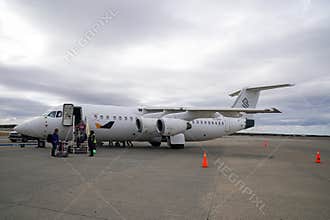 Passengers disembarking an Aerovias DAP Avro RJ100 at Presidente Carlos Ibanez del Campo International Airport in Punta Arenas