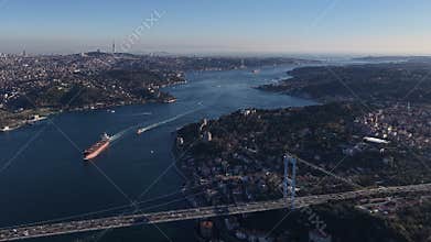 Aerial bosphorus strait bridge and cargo ship in istanbul