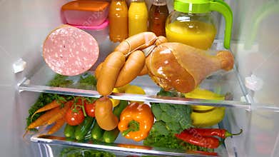 Open refrigerator filled with food
