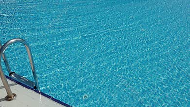 Grab bars ladder in the swimming pool