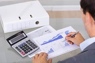 Analyst working with graph