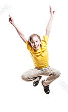 Beautiful funny child in yellow t-shirt jumping in excitement and laughing