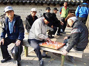 Seniors playing chinese chess