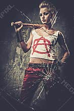 Punk girl behind broken glass