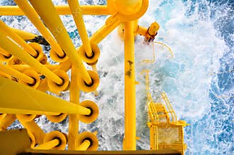 Oil and Gas Producing Slots at Offshore Platform, The platform on bad weather condition.,Oil and Gas Industry.