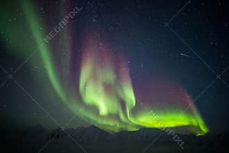 Beautiful Arctic mountain landscape with Northern Lights - Spitsbergen, Svalbard