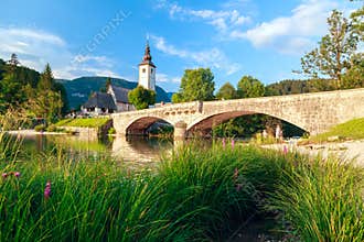 Church of Sv. John the Baptist and a bridge by the Bohinj lake