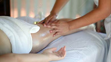 Woman getting massage treatment in beauty spa